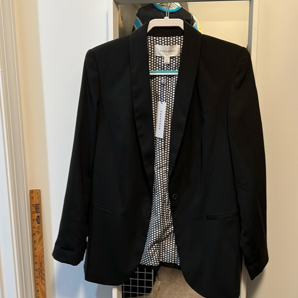 Black Popsugar Blazer, size Large. Cool star design on inside - NWT